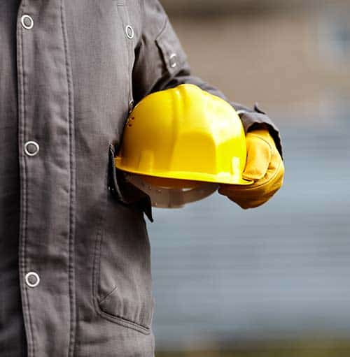construction worker holding hard hat